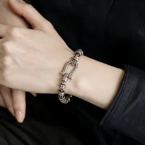 Vintage style U-shaped horseshoe bracelet with scroll engravings detail view for women fashion