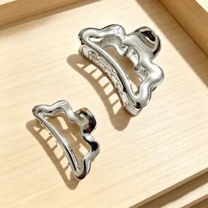 Silver metal hair claw clip set, irregular cloud shape, elegant styling accessory for women.