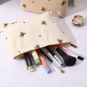 Cute corduroy bear makeup bag with large capacity, portable zipper pouch for daily storage.