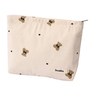 Corduroy cute bear print makeup bag portable cosmetic storage pouch with secure zipper closure.