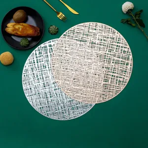 Hollow round PVC table placemat detail view showing gold and silver metallic aesthetic design.