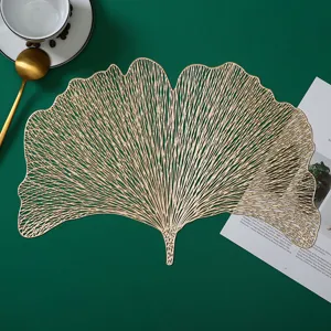 Gold ginkgo leaf hollow PVC placemat, decorative heat insulation table mat for dining room.