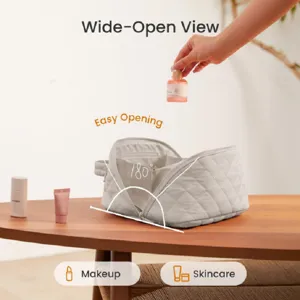 Large capacity quilted cosmetic bag with 180-degree wide opening, portable travel wash bag.