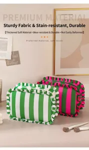 Detailed view of striped cosmetic bag with cute ruffle trim, spacious travel storage pouch.