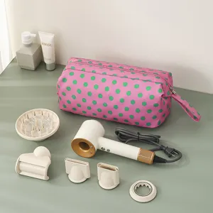 Borsa porta asciugacapelli a pois rosa con set di beccucci per styling professionali.