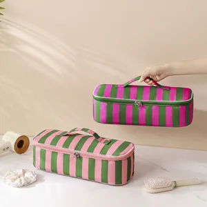 Striped portable hair dryer storage bag, large capacity hair styling tool organizer bag.