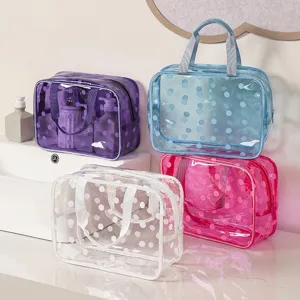 Clear polka dot waterproof cosmetic bag, large capacity portable travel toiletry organizer.