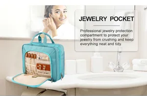 Portable travel jewelry organizer bag with hanging hook and large capacity compartments.