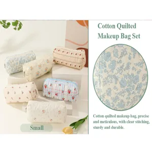 Cotton quilted makeup bag detail view, featuring delicate floral print and precise stitching.