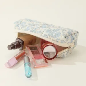 Quilted floral makeup bag detail view, large capacity cosmetic storage pouch for travel daily use.