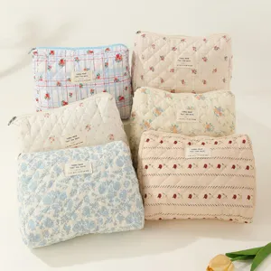 Quilted floral makeup bag set, large capacity cosmetic travel pouch, elegant organizer.