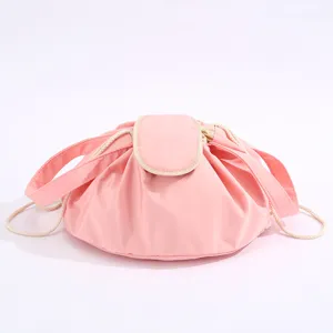 Pink lazy drawstring makeup bag, large capacity portable cosmetic pouch for travel wash storage.