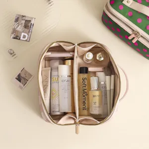 Large capacity portable cosmetic bag with double compartment, stylish color-block design.