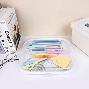 Transparent clear pencil pouch stationery storage bag detail view with organized supplies.