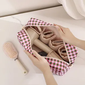 Pink plaid hair dryer storage bag, large capacity portable travel hair styling tool organizer.