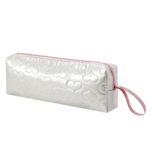 Silver quilted heart travel storage bag, portable heat-resistant makeup pouch or organizer.