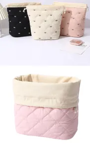 Quilted bow makeup bag with large capacity, cute portable storage pouch for travel.