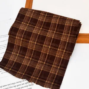 Detalle de tira de tela de cuadros marrones, ancho 14cm, ideal para manualidades de coleteros DIY.