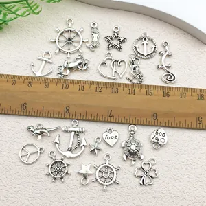 DIY dijes de aleación de metal colgantes de plata antigua para hacer joyas artesanales.