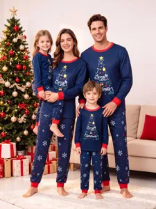 Family Christmas pajamas set with festive tree print and long sleeves for winter holidays.