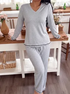 Comfortable grey V-neck long sleeve pajama set for women, soft loungewear for autumn.