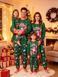Christmas family matching pajamas detail, cozy green lounge set with Santa and reindeer print.