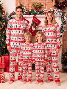 Family matching Christmas pajamas set detail showing festive reindeer and tree holiday patterns.