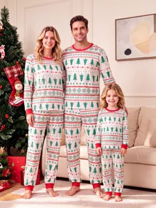 Christmas family matching pajamas set featuring festive tree print long sleeve top and soft pants.