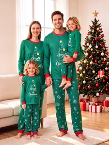 Family Christmas matching pajamas set featuring festive tree prints, cozy long sleeves.