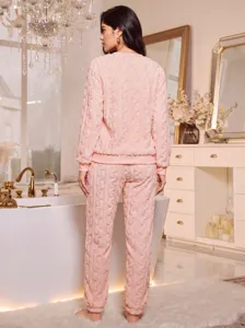 Women pink coral fleece pajamas set, thickened warm long-sleeve top and cozy lounge pants.