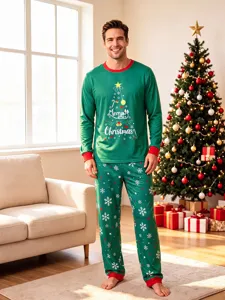 Detailed view of men's Christmas pajama set in a festive living room, featuring holiday tree print.