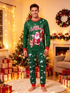 Detailed view of green Christmas family pajama set with Santa Claus graphic and cute prints.