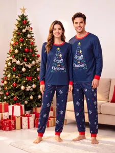 Christmas family matching pajamas detail showing cozy navy fabric and festive holiday print.