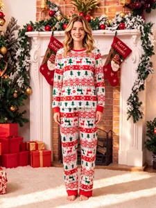 Christmas matching family pajamas set featuring long sleeve top and pants with festive reindeer and tree prints.