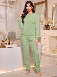Detailed view of women soft fleece loungewear set in light green with cozy long sleeves.