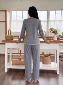 Comfortable grey long sleeve pajama set for women, cozy casual sleepwear for autumn winter.