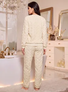 Cozy beige fleece pajama set for women, warm winter long sleeve sleepwear loungewear.