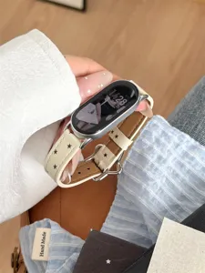 Bracelet de montre en cuir à motif d'étoiles avec boucle en métal, accessoire élégant.