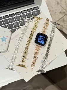 Bracelet de montre en metal zircon etoile rotative de rechange pour montre connectee Apple.
