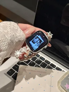 Bracelet de montre en métal avec étoiles rotatives et zircon, compatible Apple Watch.