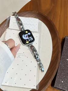 Bracelet de montre en métal étoile de luxe compatible Apple Watch, design argenté.