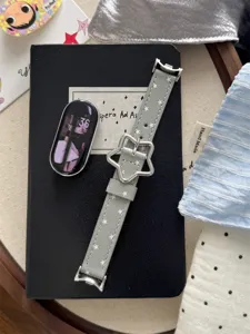 Bracelet de montre en cuir fin avec boucle en étoile, bracelet gris élégant avec fermoir étoile.