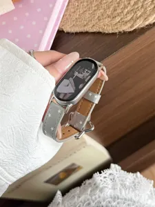 Bracelet de montre en cuir à boucle étoile mince compatible avec les séries Apple Watch élégant.