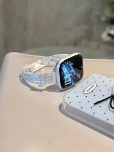Rhinestone bow watch band compatible with Apple Watch, sparkling crystal metal replacement strap.