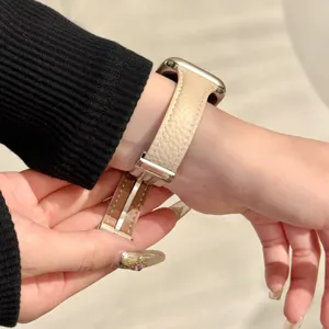 Slim genuine leather watch strap with elegant waist design worn on wrist for smart watch