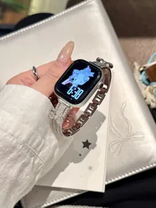 Exquisite 3D bow diamond watch strap detail, sparkling crystal metal band for smart watch.