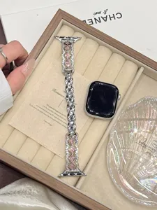 Metal crystal watch band compatible with Apple Watch, stylish pink stone replacement strap.