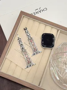 Metal chain rhinestone watch band compatible with Apple Watch, stylish pink square crystal design.