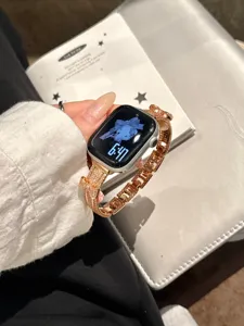 Close-up of rose gold rhinestone Apple Watch strap featuring a stunning 3D crystal bow design.