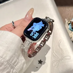 Bling rhinestone bow watch strap compatible with Apple Watch, sparkly metal replacement band.